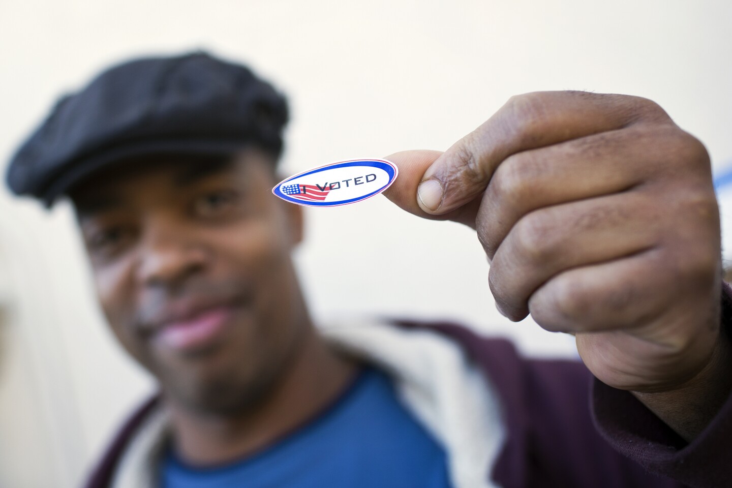 Al Gordon puts on his "I Voted" sticker after voting in the Los Angeles County primary election on Tuesday, March 3, 2015 at Saint Mary of the Angels in Los Feliz.