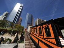 File: The Angels Flight Railway ferries passengers up and down Bunker Hill in downtown Los Angeles March 15, 2010.