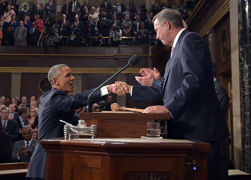 President Barack Obama shakes hands with Speaker of the House John Boehner as he arrives to deliver the State of the Union speech before members of Congress in the House chamber of the U.S. Capitol Jan. 20, 2015 in Washington, DC.
