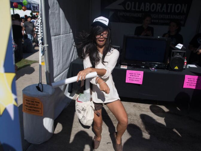 Alana Mancao, 16, of Chino Hills performs the now-infamous dance to PSY's viral song Gangnam Style in a tent at the KCON convention on Sunday.