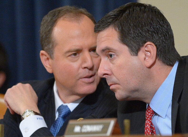 Ranking member Rep. Adam Schiff (D-CA) and chairman Rep. Devin Nunes (R-CA) (R) speak during the House Permanent Select Committee on Intelligence hearing on Russian actions during the 2016 election campaign on March 20, 2017 on Capitol Hill in Washington, D.C.