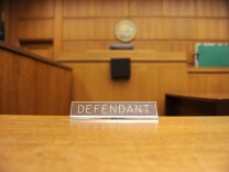 A view of the defendant's table in a courtroom closed due to budget cuts and layoffs, at the Stanley Mosk Courthouse in downtown Los Angeles on March 16, 2009. Beset by an unprecedented budget crisis, the LA Superior Court, the largest trial court system in the US, laid off 329 employees and announced the closure of 17 courtrooms, with more of both expected in the future.