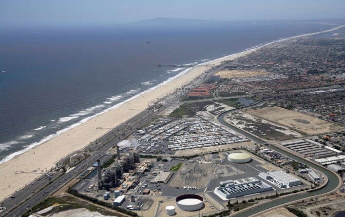 Poseidon Water has proposed a desalination plant in Huntington Beach and wants to use existing open-water intake for collecting and discharging water. The California Coastal Commission staff is recommending approval of the project but with conditions that include using subsurface intakes. (Photo: Artist rendering of Poseidon Water desalination plant proposed for Huntington Beach, Calif.)