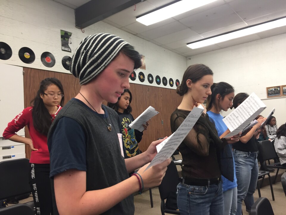 Eleventh grader Percy Ragsdale, wearing the hat, practices with the rest of the Canyon Advanced Treble Clef choir in preparation for their Winter Concert.