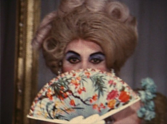 In what's believed to be a screen test by artists Avery Willard, Mario Montez is dressed as an elegant Victorian woman who catches the eye of a suitor off-screen and tosses him a rose. "Mario brought a little bit of humor and coyness to his performances," says Conrad Ventur. "He's never going to let you take your eyes away because he's going to go somewhere and, a split second later, it's going to change."