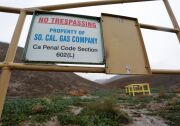 A sign marking the boundary of the Aliso Canyon storage facility is pictured in Porter Ranch, California, January 6, 2016.  California Governor Jerry Brown on January 6, 2016 declared a state of emergency in the Porter Ranch area due to the continuing leak of natural gas from the Aliso Canyon storage facility operated by the Southern California Gas Co.   AFP PHOTO / JONATHAN ALCORN / AFP / JONATHAN ALCORN        (Photo credit should read JONATHAN ALCORN/AFP/Getty Images)