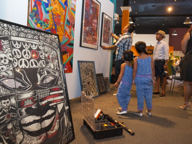 Local artists display work at the Cambodian Genocide Remembrance Day event at the Expo Arts Center in Bixby Knolls, (Long Beach), Calif. on Friday, April 17, 2015. The event was organized to bring awareness to the suffering of those under the Khmer Rouge and to bring together different generations to heal and remember the suffering and lives lost 40 years ago. 