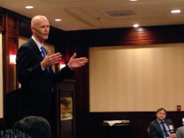 Florida Governor Rick Scott spoke to a gathering of business leaders in Woodland Hills and part of his two-day trip to California.