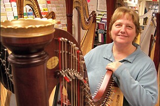Sylvia Woods with her harp.