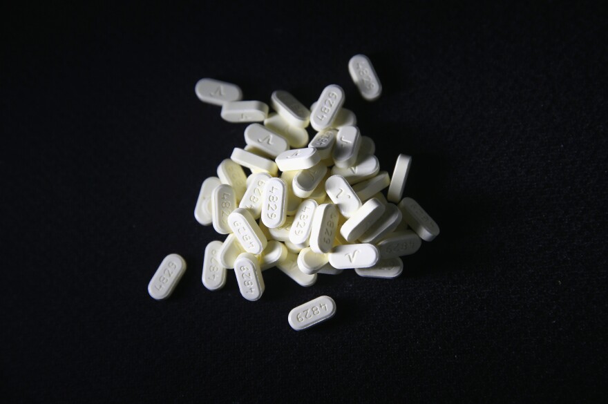 NORWICH, CT - MARCH 23: Oxycodone pain pills prescribed for a patient with chronic pain lie on display on March 23, 2016 in Norwich, CT. On March 15, the U.S. Centers for Disease Control (CDC), announced guidelines for doctors to reduce the amount of opioid painkillers prescribed, in an effort to curb the epidemic. The CDC estimates that most new heroin addicts first became hooked on prescription pain medication before graduating to heroin, which is stronger and cheaper. (Photo by John Moore/Getty Images)