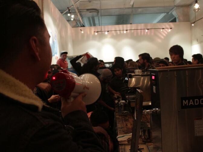 Jonathen Liu addresses the crowd at the Thursday Night Latte Art Throwdown.