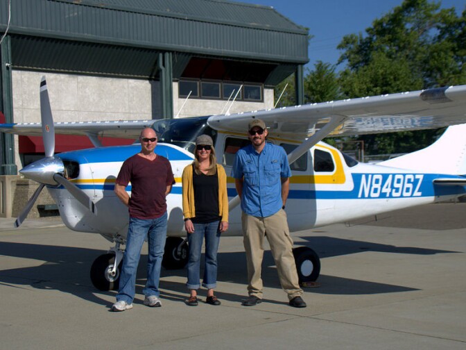 Jeff Moore, left, is an aerial surveyor for the US Forest Service in California. He spends five hours a day in this plane, counting dead trees out the window. 