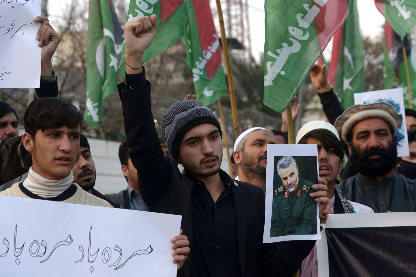 Protesters shout slogans against the United States during a demonstration following a US airstrike that killed top Iranian commander Qasem Soleimani in Iraq, in Peshawar on January 3, 2020. - A US strike killed top Iranian commander Qasem Soleimani at Baghdad's international airport On January 3, dramatically heightening regional tensions and prompting arch enemy Tehran to vow "revenge". (Photo by Abdul MAJEED / AFP) (Photo by ABDUL MAJEED/AFP via Getty Images)