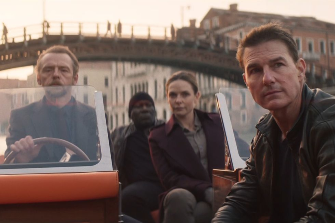 Tom Cruise along with Rebecca Ferguson, Simon Pegg, and Ving Rhames are all on a small motor boat, driving down a river somewhere in Europe.