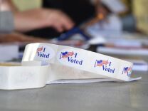 I VOTED stickers are seen at a polling station on the campus of the University of California, Irvine, on November 6, 2018 in Irvine, California on election day. - Americans vote Tuesday in critical midterm elections that mark the first major voter test of Donald Trump's presidency, with control of Congress at stake. (Photo by Robyn Beck / AFP)        (Photo credit should read ROBYN BECK/AFP/Getty Images)