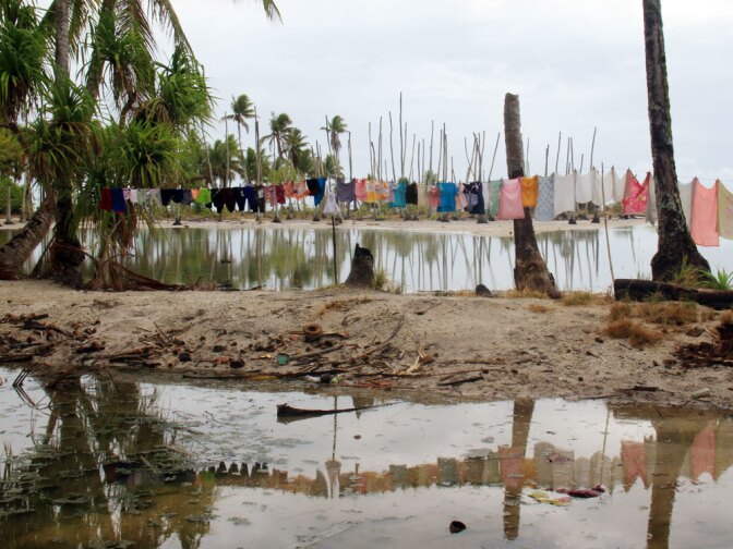 The village of Tebunginako, on one of Kiribati's remote outer islands, Abaiang. Residents were forced to relocate after the sea inundated the  village.