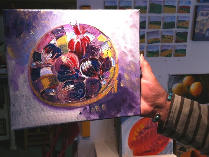 Frank Romero with one of his French paintings, in his home in the South of France.