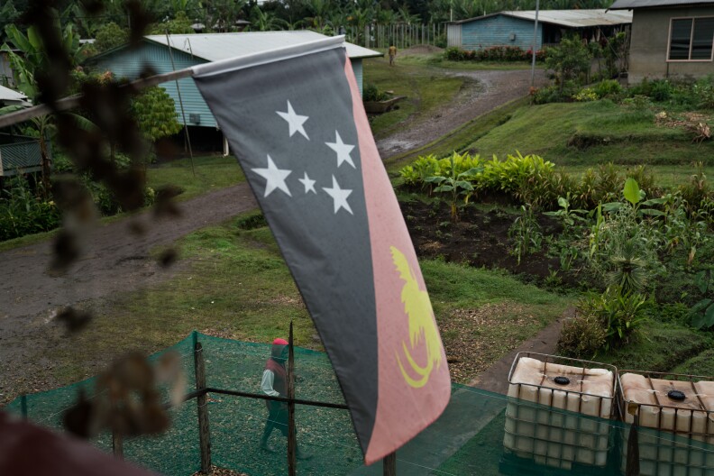 A man walks outside a safe house in Goroka, the capital of Papua New Guinea's Eastern Highlands Province. People fleeing sorcery accusations sometimes seek shelter here.