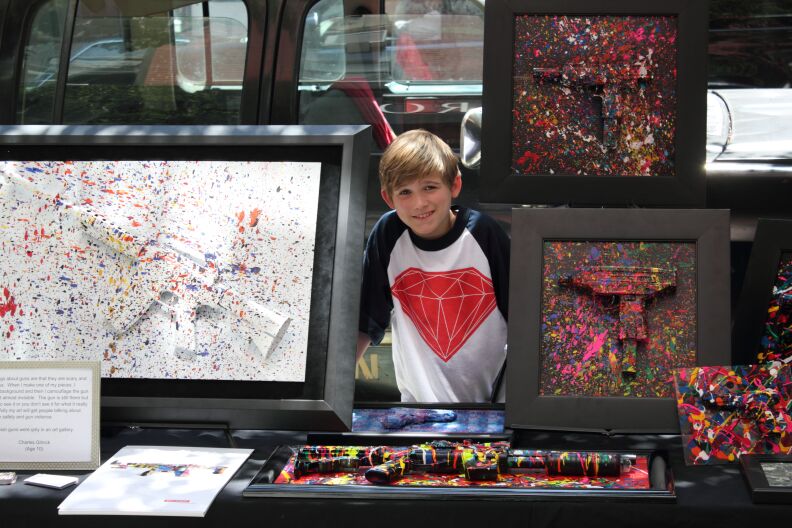 Charles Gitnick with some of his artwork