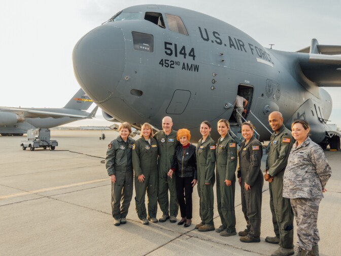Elinor Otto (fourth from the left) poses with members of the flight crew and Air Force Reserve officials, including Lt. Gen. Maryanne Miller (left), the first female commander of the Air Force Reserve.