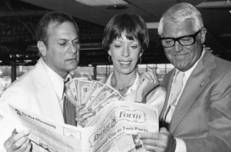Tony Curtis, Carol Burnett and Cary Grant enjoying themselves at Hollywood Park in May 1978. 