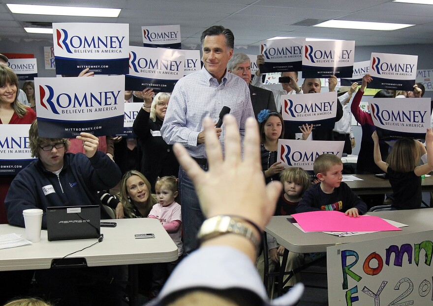 LIVONIA, MI - FEBRUARY 28:  Republican presidential candidate and former Massachussetts Gov. Mitt Romney looks on during a press availability following a visit to his Michigan campaign headquarters on February 28, 2012 in Livonia, Michigan. Romney visted his Michigan campaign headquarters an primary day as Michigan residents go to the polls to vote for their choice in the Republican presidential race. (Photo by Justin Sullivan/Getty Images)