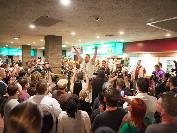 Andrew McGregor dressed as Walter from the film, "The Big Lebowski," rallies the crowd during a costume contest at Lebowski Fest on Saturday, Mar. 14, 2015.