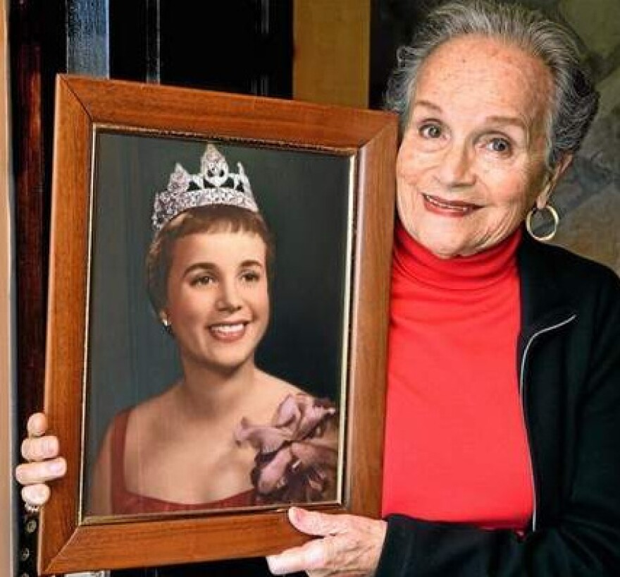Joan Williams, 82, holds a portrait of herself as Pasadena's Miss Crown City in 1958.