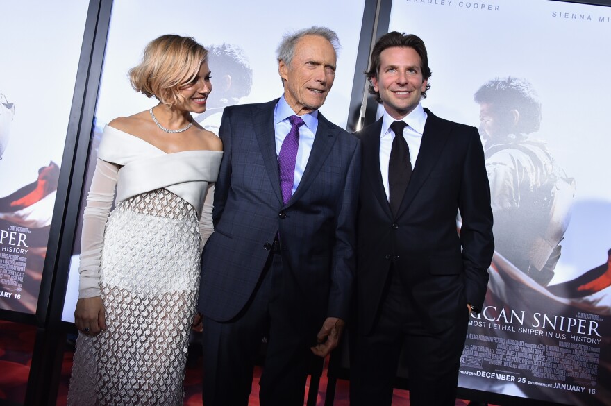 NEW YORK, NY - DECEMBER 15:  (L-R) Sienna Miller, Clint Eastwood and Bradley Cooper arrive at the "American Sniper" New York Premiere at Frederick P. Rose Hall, Jazz at Lincoln Center on December 15, 2014 in New York City.  (Photo by Theo Wargo/Getty Images)
