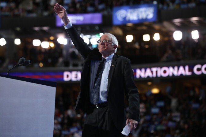 Sen. Bernie Sanders (I-VT) acknowledges the crowd before delivering remarks on the first day of the Democratic National Convention at the Wells Fargo Center in Philadelphia, Pennsylvania. 