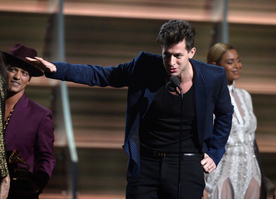 LOS ANGELES, CA - FEBRUARY 15:  Producer Mark Ronson accept the Record Of The Year award for 'Uptown Funk' onstage during The 58th GRAMMY Awards at Staples Center on February 15, 2016 in Los Angeles, California.  (Photo by Kevork Djansezian/Getty Images)