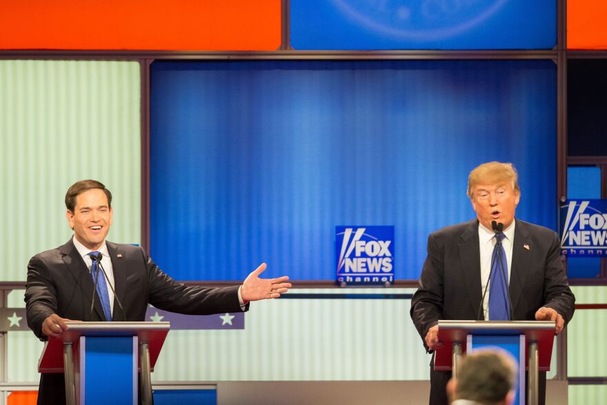 US Republican Presidential Candidates Marco Rubio (L) and Donald Trump participate in the Republican Presidential Debate in Detroit, Michigan, March 3, 2016.
