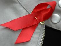 File A red ribbon is one of the symbols of World Aids Day. 
