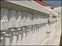 This close-up of the outside railings shows the detailed carving. All of the stone was hand-carved in India and imported to the United States.