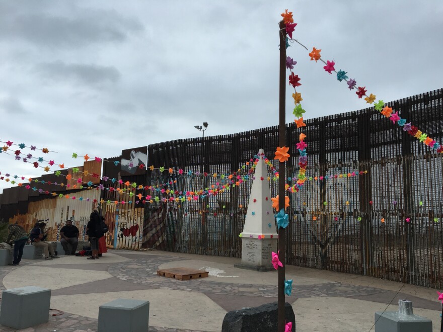 Image from the annual musical celebration known as Fandango Fronterizo at the border fence between the San Diego in the U.S. and Tijuana, Mexico.
