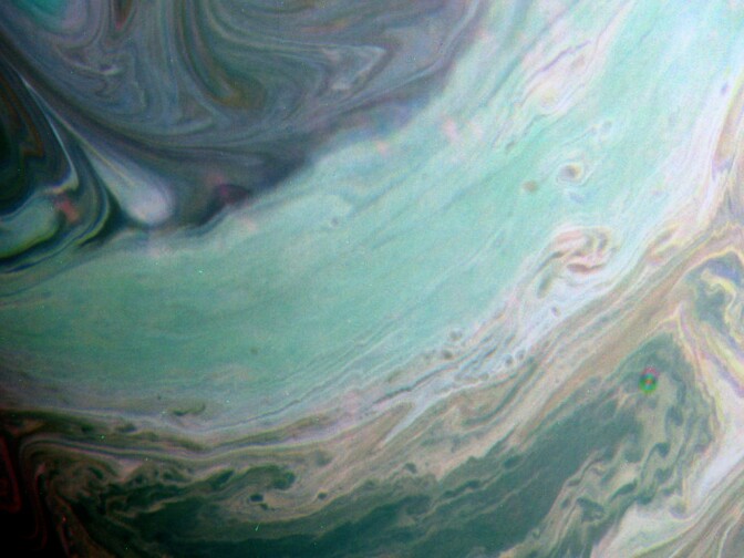 A false-color view of Saturn's clouds. From the producer, Kevin M. Gill: This image is "made from uncalibrated (raw) infrared filtered images from Cassini, taken on July 20, 2016. I mapped the CB2 filtered image (.75 micron wavelength) to red, MT2 (.727 microns) to green, and MT1 (.619 microns) to blue."