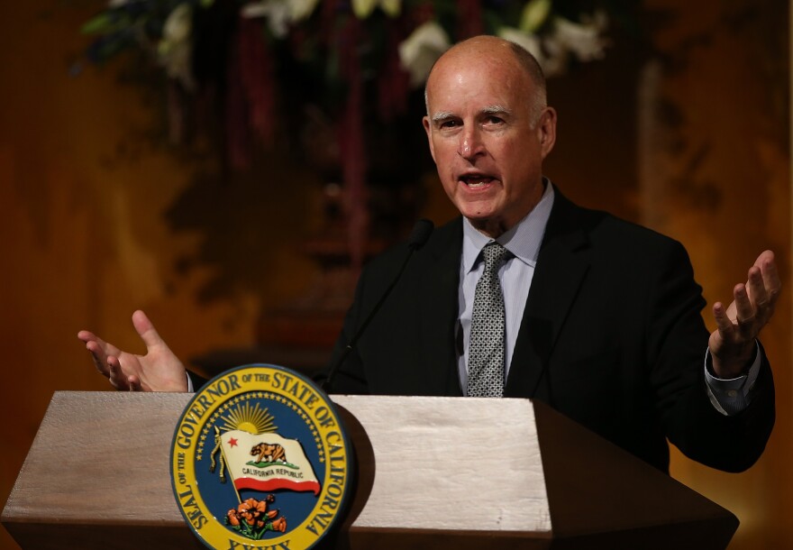SACRAMENTO, CA - SEPTEMBER 08:  California Gov. Jerry Brown speaks during an portrait unveiling ceremony in the Rotunda of the State Capitol on September 8, 2014 in Sacramento, California. Former California Gov. Arnold Schwarzenegger was joined by current Gov. Jerry Brown to unveil his official gubernatorial portrait at the State Capitol.  (Photo by Justin Sullivan/Getty Images)