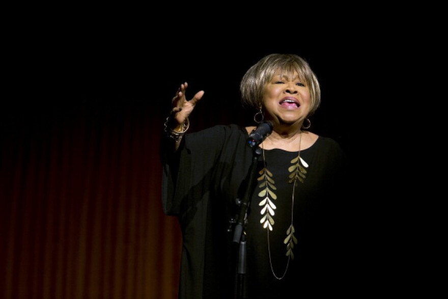 Mavis Staples sings prior to a speech by former President Bill Clinton on the second day of the Civil Rights Summit at the LBJ Presidential Library April 9, 2014 in Austin, Texas.