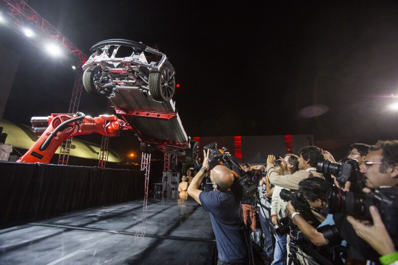 Tesla Motors Inc., unveils its new car Tesla "D"   in Hawthorne, Calif., Thursday, Oct. 9, 2014. (AP Photo/Ringo H.W. Chiu)