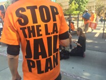 More than 150 activists protested LA County's plan to build a new mental health jail. They argue the money should be spent instead on community mental health programs.