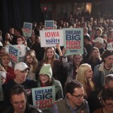 WEST DES MOINES, IOWA - NOVEMBER 25: Guests wait for Democratic presidential candidate Sen. Elizabeth Warren (D-MA) to speak at a campaign stop at the Val Air Ballroom on November 25, 2019 in West Des Moines, Iowa. The 2020 Iowa Democratic caucuses will take place on February 3, 2020, making it the first nominating contest for the Democratic Party in choosing their presidential candidate. (Photo by Scott Olson/Getty Images)