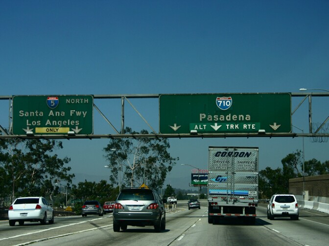 File: An I-5 exit sign with an I-710 pull-through sign, northbound.