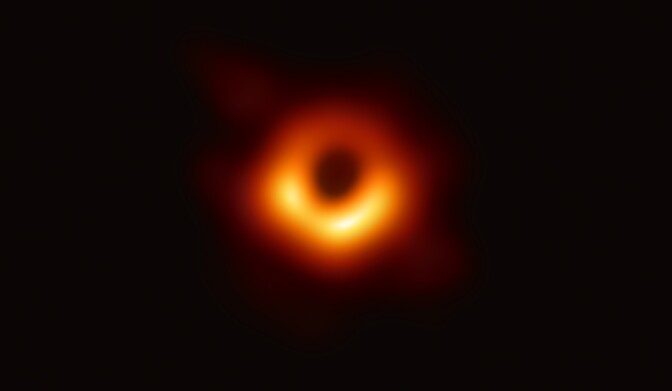 In this handout photo provided by the National Science Foundation, the Event Horizon Telescope captures a black hole at the center of galaxy M87, outlined by emission from hot gas swirling around it under the influence of strong gravity near its event horizon, in an image released on April 10, 2019.