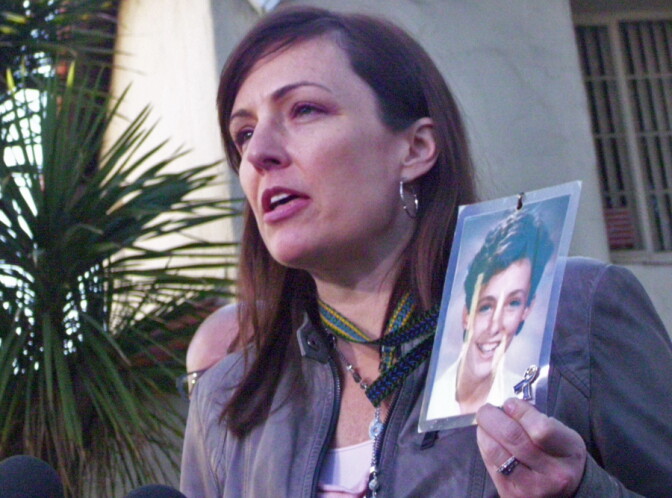 Survivors Network for those Abused by Priests (SNAP) regional director Joelle Castiex calling on Cardinal Roger Mahony not to attend the papal conclave, Saturday, Feb. 23, 2013. She herself was abused by a priest as a child.