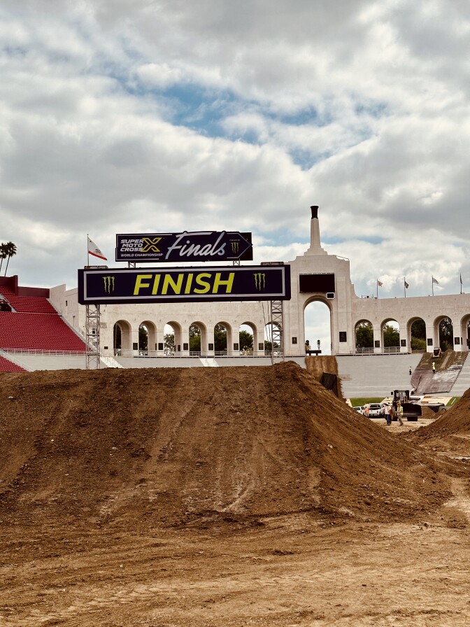 a gigantic standing pile of dirty by the "finish" line inside the L.A. Coliseum 