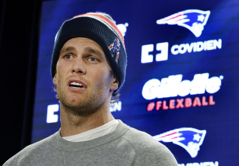 New England Patriots quarterback Tom Brady speaks at a news conference in Foxborough, Mass., Thursday, Jan. 22, 2015 as he addresses the issue of the NFL investigation of deflated footballs. (AP Photo/Elise Amendola)