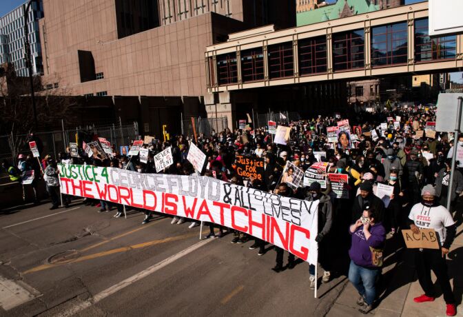 MINNEAPOLIS, MN - MARCH 08: People march during a demonstration in honor of George Floyd on March 8, 2021 in Minneapolis, Minnesota. Jury selection is scheduled to begin today in the trial of former Minneapolis Police officer Derek Chauvin in the death of George Floyd last May. (Photo by Stephen Maturen/Getty Images)