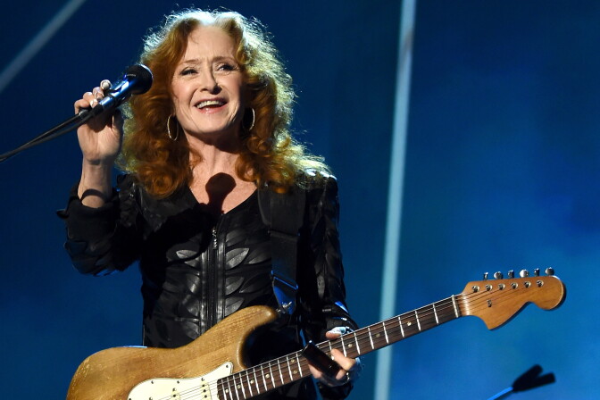 Musician Bonnie Raitt performs onstage at the 25th anniversary MusiCares 2015 Person Of The Year Gala honoring Bob Dylan at the Los Angeles Convention Center on February 6, 2015 in Los Angeles, California. 