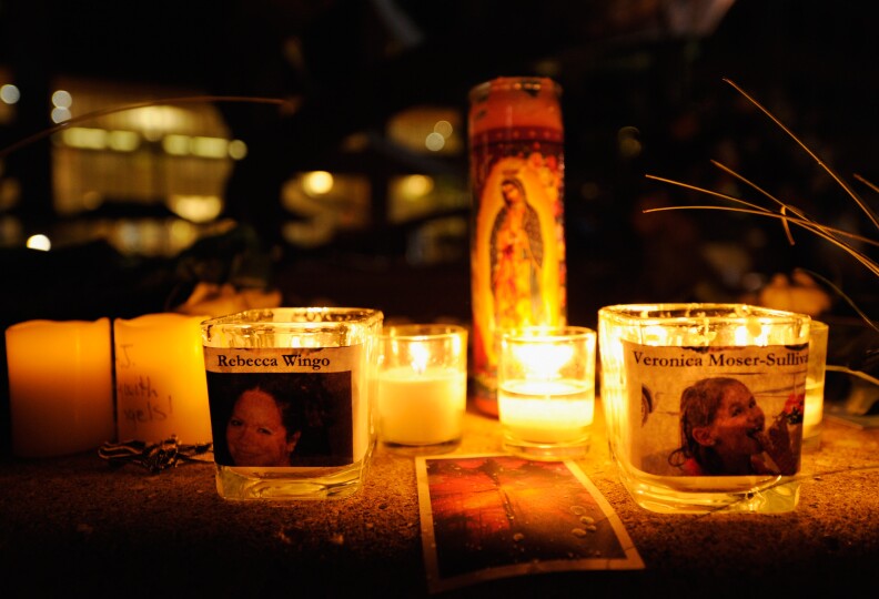 Vigil for the 12 victims of Friday's mass shooting at the Century 16 movie theater, on July 22, 2012 in Aurora, Colorado. Suspect James Holmes, allegedly went on a shooting spree and killed 12 people and injured 59 during an early morning screening of 'The Dark Knight Rises.'
