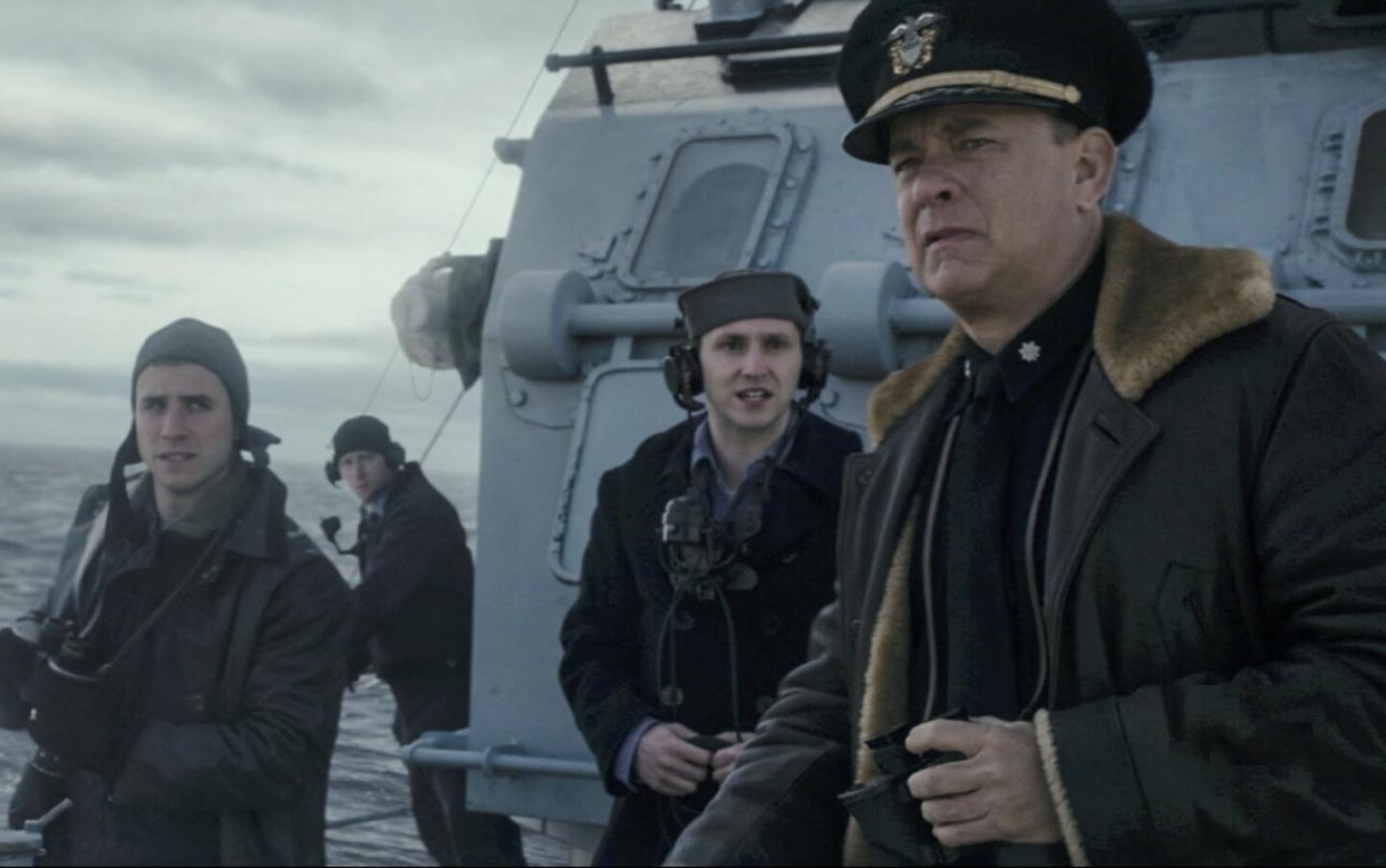 Michael Carollo (L) and Tom Hanks (R) in Greyhound. 